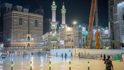 Worshipers perform Al Fajr prayer at the holy mosque in Makkah as it welcomes back public prayers for the first time in seven months. Reuters
