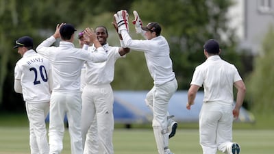 Archer celebrates one of his six wickets. PA Photo