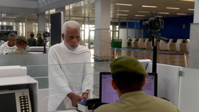 Muslim pilgrims go through passport control upon their arrival to King Abdulaziz International Airport in Jeddah on July 7, 2019, prior to the annual Hajj pilgrimage in the holy city of Mecca. AFP