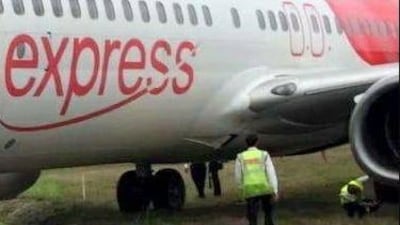 An Air India Express plane veers off the landing strip at Mangalore, after taking off from Dubai on Sunday. Asian News International, ANI