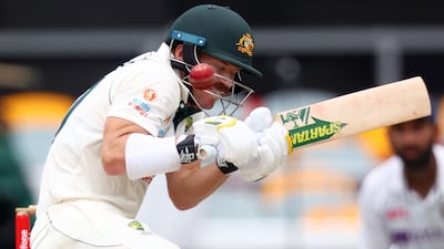 Australia batsman David Warner tries to avoid a bouncer from India's Shardul Thakur. AFP