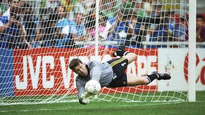 Ireland goalkeeper Pat Bonner makes a save during the penalty shoot-out against Romani in the Last-16 matche at the 1990 World Cup. Ireland won 5-4 on penalties and advanced to the quarter-finals. AllsportUK /Allsport