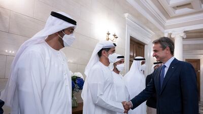 Ali Al Shamsi, deputy secretary general of the Supreme National Security Council, is received by Mr Mitsotakis alongside Dr Sultan Al Jaber, Minister of Industry and Advanced Technology (L); Sheikh Zayed bin Mohamed (3rd L), Sheikh Mohammed bin Hamad, Adviser for Special Affairs at the Presidential Court (4th L); and Deputy Prime Minister and Minister of Presidential Affairs (5th L).
