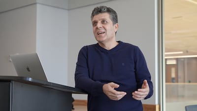 Hadi speaking in a classroom at the University of Nebraska