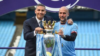Manchester City manager Pep Guardiola, right, celebrates with chairman Khaldoon Al Mubarak after being crowned 2022/23 Premier League champions. EPA