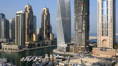 The value of Dubai property deals in 2014 fell 7.6 per cent to Dh218 billion compared with the previous year. Above, Dubai Marina. Sarah Dea / The National