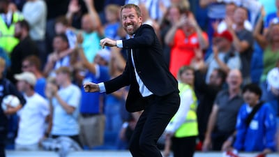 Graham Potter celebrates after Brighton's win over Leicester City. Getty