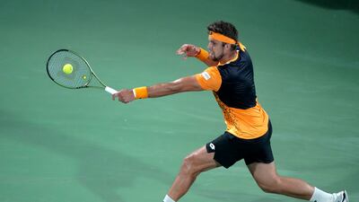Jiri Vesely plays a backhand to Novak Djokovic. AP