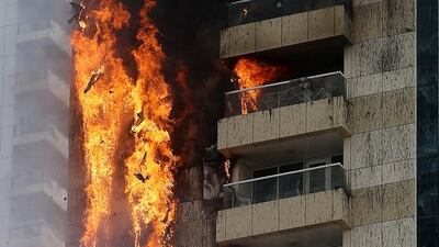 The blaze in the 75-storey, 285-metre high tower, caused chaos on streets around Dubai Marina with people returning from work unable to reach their homes as police closed off nearby roads to prevent any injuries from falling debris.
