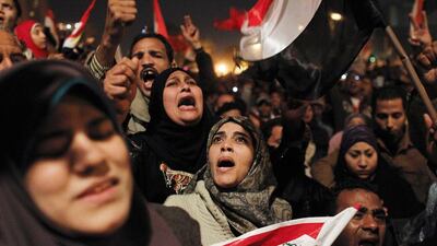 Egyptian women celebrate in Tahrir Square after the downfall of president Hosni Mubarak. Tara Todras-Whitehill / AP