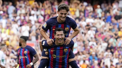 FC Barcelona's Polish striker Robert Lewandowski (botom) celebrates after scoring the 3-0 lead during a Spanish LaLiga soccer match between FC Barcelona and Elche CF at Spotify Camp Nou stadium in Barcelona, Spain, 17 September 2022. EPA / Alejandro Garcia