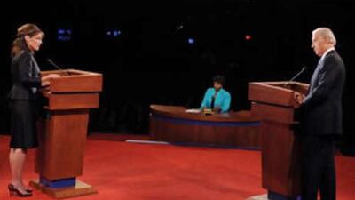 Sarah Palin and Joe Biden respond to questions from moderator Gwen Ifill of PBS, centre, during their vice presidential debate on Oct 2 2008, in St Louis.