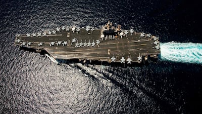 The USS Abrahim Lincoln loiters near Iran. The Iranian army chief has warned the US and Israel against an attack. AFP