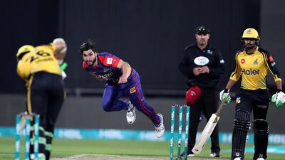 Karachi's Usman Shinwari in bowling action against Peshawar.