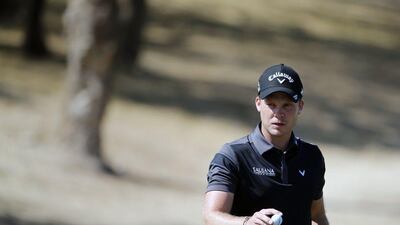 Danny Willett of England is the Dubai Desert Classic leader by one shot heading into Sunday's final round. Karim Sahib / AFP / February 6, 2016