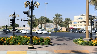 The renowned clock structure was relocated to the Hessa Bint Mohamed Street and Zayed Bin Sultan Street intersection. Photo: Khushnum Bhandari / The National