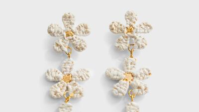 Mango’s gold-toned raffia drop earrings are super-cute for daywear; Dh99 at Namshi.com. Photo: Mango