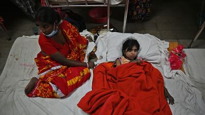 A girl rescued from the ferry fire gets treatment in Barishal, Bangladesh. AP Photo