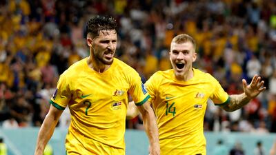 Australia's Mathew Leckie celebrates scoring Riley McGree. Reuters
