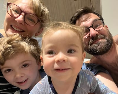 Nicola, husband and sons sheltering together during a missile alert in Abu Dhabi. Nicola Leech / The National