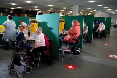 NHS staff administer the Oxford-AstraZeneca Covid-19 coronavirus vaccine in St Helens, United Kingdom. Getty Images