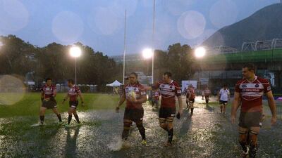 Japan players leave the ground after winning the Asia Rugby Championship following their match against Hong Kong on Saturday. Dale de la Rey / AFP / May 23, 2015
