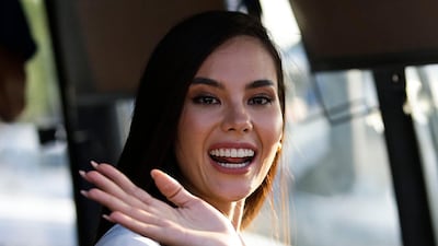 Catriona Gray waves as she arrives for a visit in Manila. AP Photo