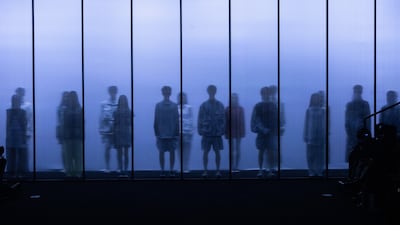 Models present creations at the Lantu by Huazhou He runway show during China Fashion Week in Beijing. EPA