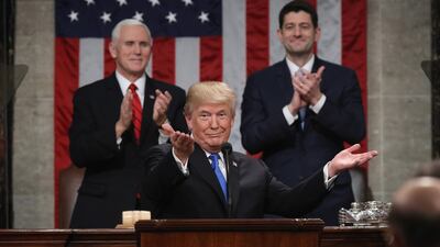 US President Donald Trump delivers the 2018 State of the Union address as Vice President Mike Pence and then speaker of the House of Representatives Paul Ryan look on. AFP