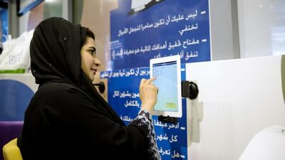 The financial literacy bus, sponsored by the Emirates Foundation for Youth Development, aims to educate young people on how to manage money and avoid debt, at Jumeirah at Etihad Towers in Abu Dhabi. Christopher Pike / The National