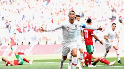 Cristiano Ronaldo celebrates scoring against Morocco in Moscow, a header that would take the Portugal striker to four World Cup goals in two matches at Russia 2018. Peter Powell / EPA