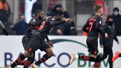 Franck Kessie and teammates celebrate scoring Milan's first goal that was later disallowed after by a VAR review. Reuters