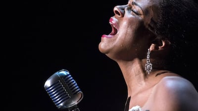 Audra McDonald broke the record for most Tony's winning her sixth statue at the Award show on Sunday. She cries as she performs the song "Strange Fruit" as Billie Holiday in the production of "Lady Day at Emerson's Bar and Grill" at the Circle in the Square Theatre in New York in this file photo from March 24, 2014. She is the first woman to win in all four Tony acting categories. Reuters