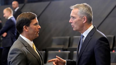 NATO Secretary General Jens Stoltenberg (R) with US Secretary of Defense Mark Esper during a NATO defence ministers meeting in Brussels. Reuters