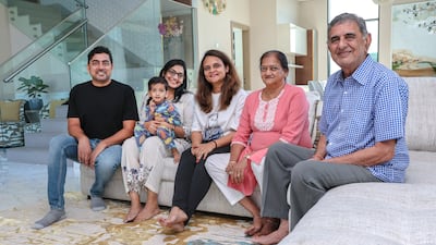 From left to right: Naveen Nahata, Deepika and Vansh Nahata, Poonam Jain, Sayar Devi Nahata and Raj Kumar Nahata live in a five-bedroom villa in Al Furjan. All photos: Victor Besa / The National