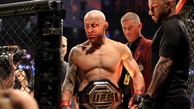 Alexander Volkanovski celebrates his unanimous decision win over Max Holloway at UFC 276. Getty