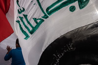 The Iraqi flag at Baghdad's Tahrir Square during a protest. Getty images
