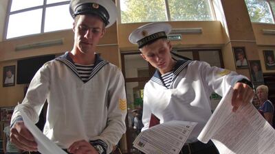 Cadets of the Nakhimov naval academy vote at a polling station during Russia's parliamentary elections in Sevastopol, Crimea. AFP
