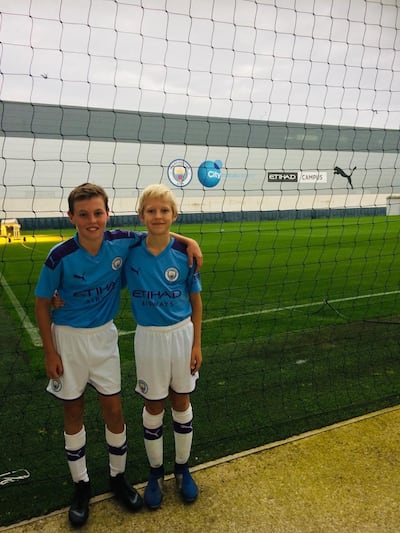 Thomas Nesbitt and Robert March receiving coaching at the top class facilities provided by Premier League winners, Manchester City. Courtesy City Football Schools