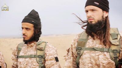 This image grab taken from a propaganda video released on November 16 shows alleged ISIL member Maxime Hauchard, right, before he took part in the beheadings of at least 18 men described as Syrian military personnel. AFP