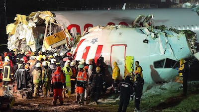 Rescuers work to extract passengers from the crash of a Pegasus Airlines Boeing 737 airplane, after it skidded off the runway upon landing at Sabiha Gokcen airport in Istanbul. AFP