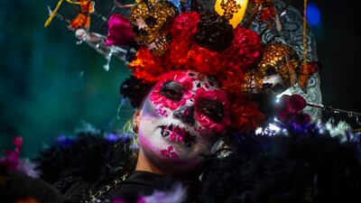 A participant at the Catrinas procession, part of the celebrations for the Day of the Dead, in Mexico City, Mexico. EPA