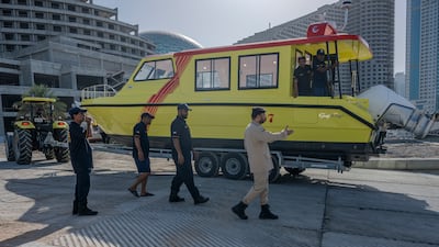 Maj Mahmoud Al Zarouni, director of Al Khalidiya Civil Defence Station and head of the Marine Rescue Team, takes part in a maritime rescue exercise