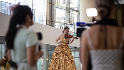 Race day builds at Meydan Racecourse as crowds arrive ahead of the first race