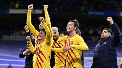 Barcelona players celebrate at the end of the match after beating Real Madrid 4-0. AFP