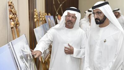 Sheikh Mohammed is given a tour of the Family Village building.