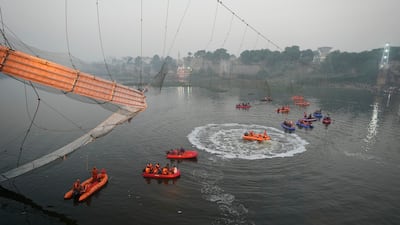 Search and rescue work in progress after a cable suspension bridge collapse in Morbi, Gujarat state, India. AP