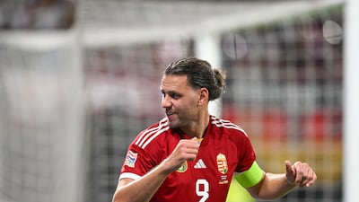 Hungary's Adam Szalai celebrates after scoring the only goal. EPA