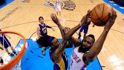 The Oklahoma Thunder, in white, proved to be physically stronger than the Los Angeles Lakers in Game 1 last night.