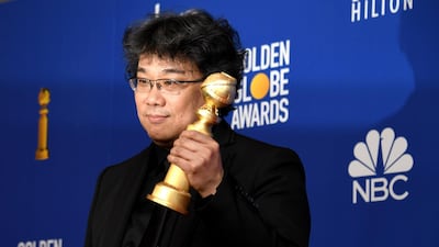 Bong Joon-ho poses with his award for Best Motion Picture - Foreign Language for 'Parasite' during the 77th annual Golden Globe Awards on January 5, 2020, at The Beverly Hilton hotel in Beverly Hills, California. EPA